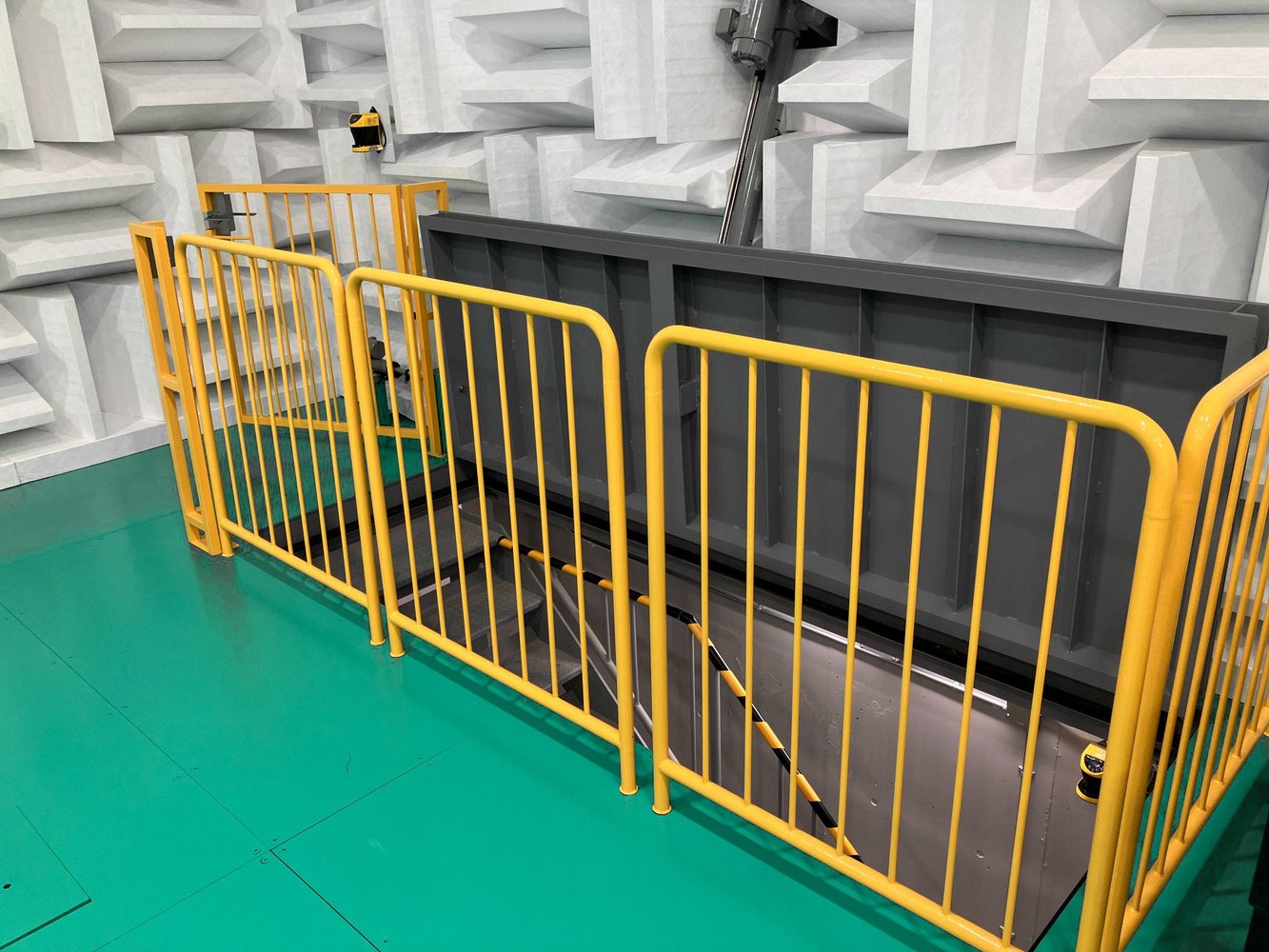  Indoor pit area, acoustic wedges, and safety railings
